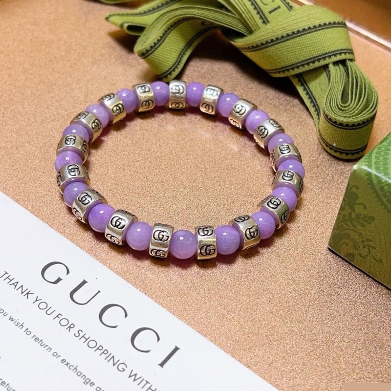 G*u*i bracelets